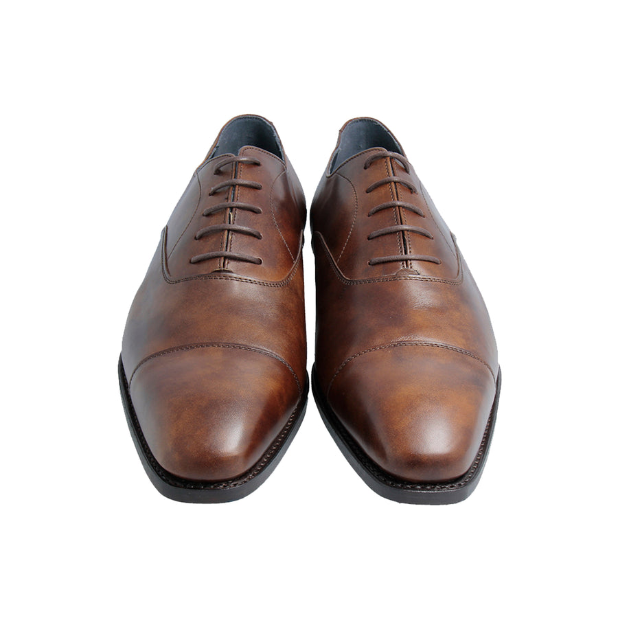 We introduce our signature captoe oxford in our c157 soft chisel last